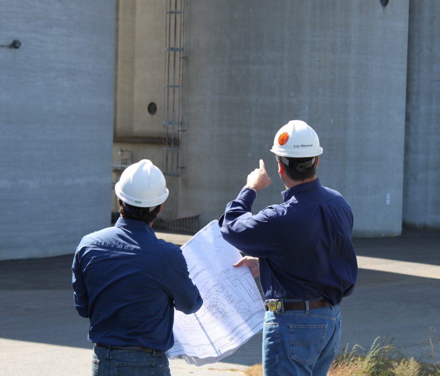 Engineers inspecting a silo