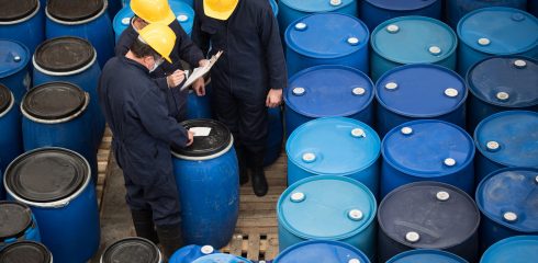 Engineers at a chemical facility classifying barrels