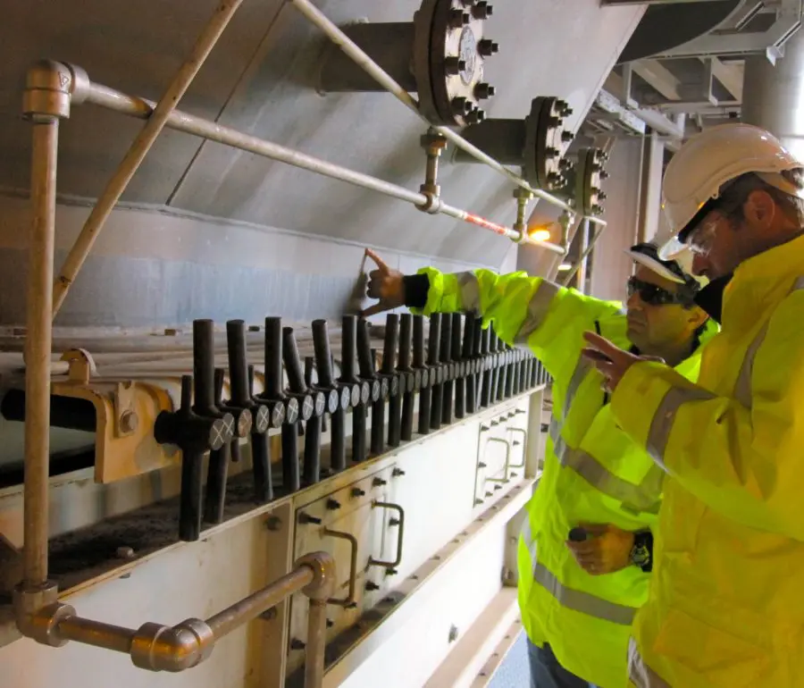 Engineers inspecting a silo